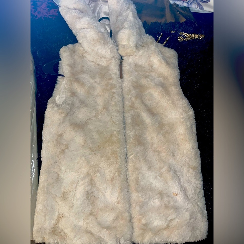 Woman’s white fur coat